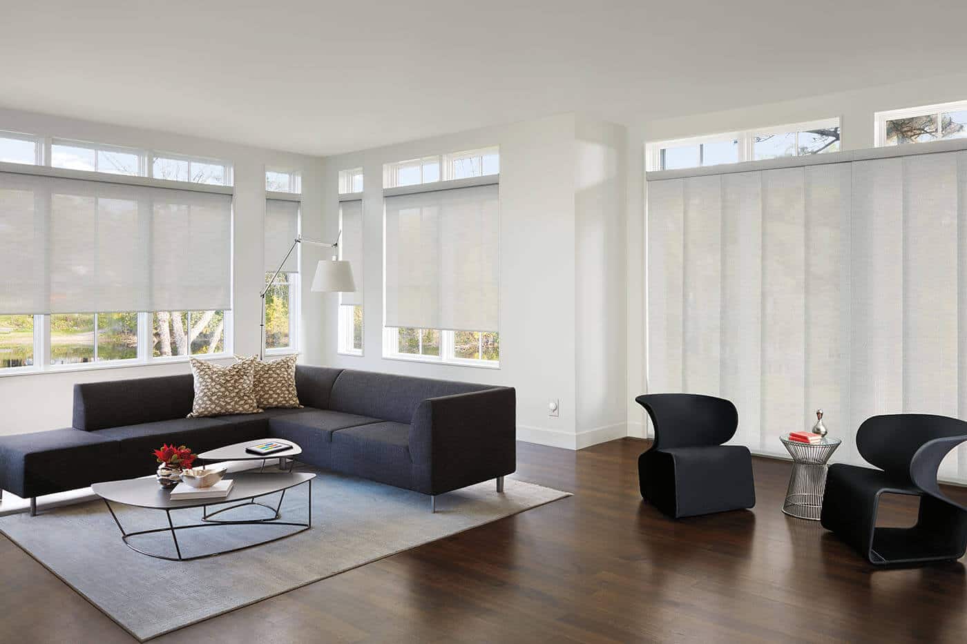 panel-glide-blinds-benefit-02 Stylish and functional Glide Blinds in modern living room for relaxed and casual look. Handcrafted to cover large windows. For sale in our Brisbane Showroom.
