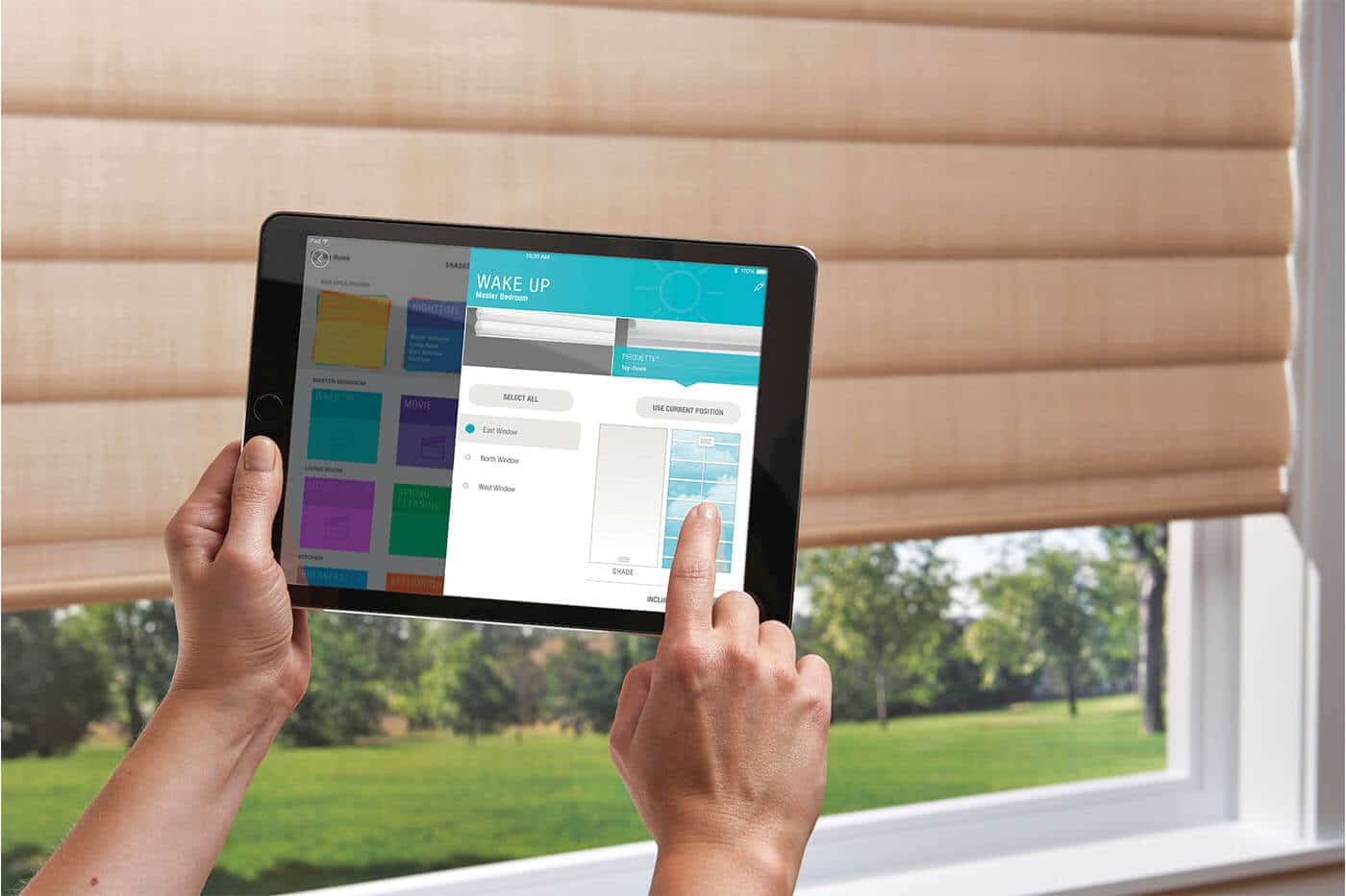 powerview-benefit-09 Person using a tablet for window blinds installation service, personalised one-on-one consultation to design window coverings that best suit a home by Complete Blinds Brisbane.