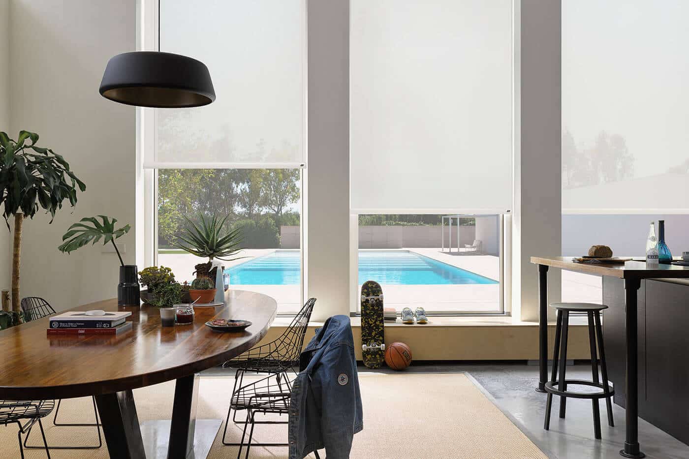 Aesthetic and functional Roller Blinds in contemporary dinning space. Available in Blockout, Sunscreen and Translucent fabrics. Available at Complete Blinds Brisbane.