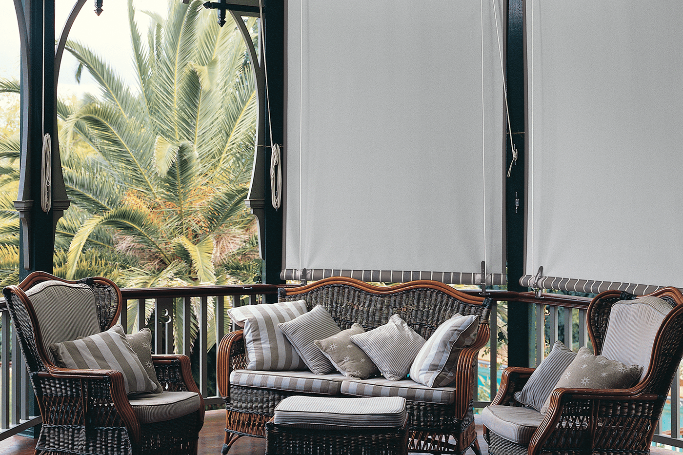 straight-drop-awnings-benefits-08 Mid-century style of a home patio with stickley furnitures, featuring Straight Drop Awnings which can be raised or lowered using a rope and a pulley system. By Complete Blinds Australia.