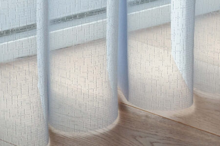 Close-up image of sheer white smart drapes curtain, signifying quality and durability by Complete Blinds Brisbane.