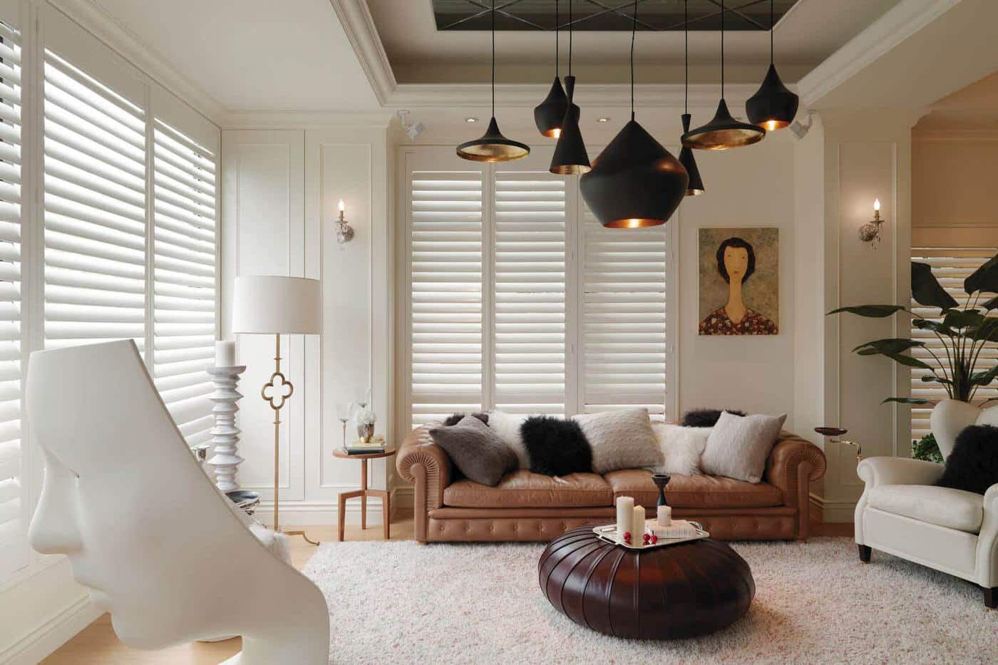 Modern, transitional, and contemporary themed living room featuring white window blinds by Complete Blinds Indooroopilly.
