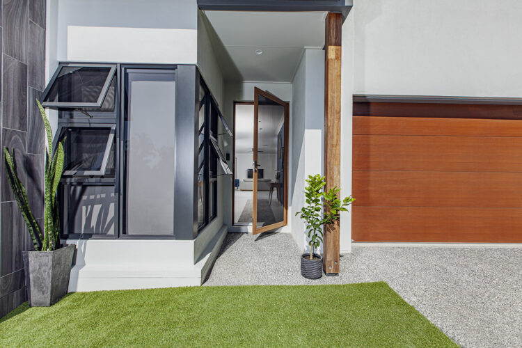 Modern and luxurious home, with main door entrance installed with Crimsafe, for safety and protection. By Complete Blinds Brisbane.