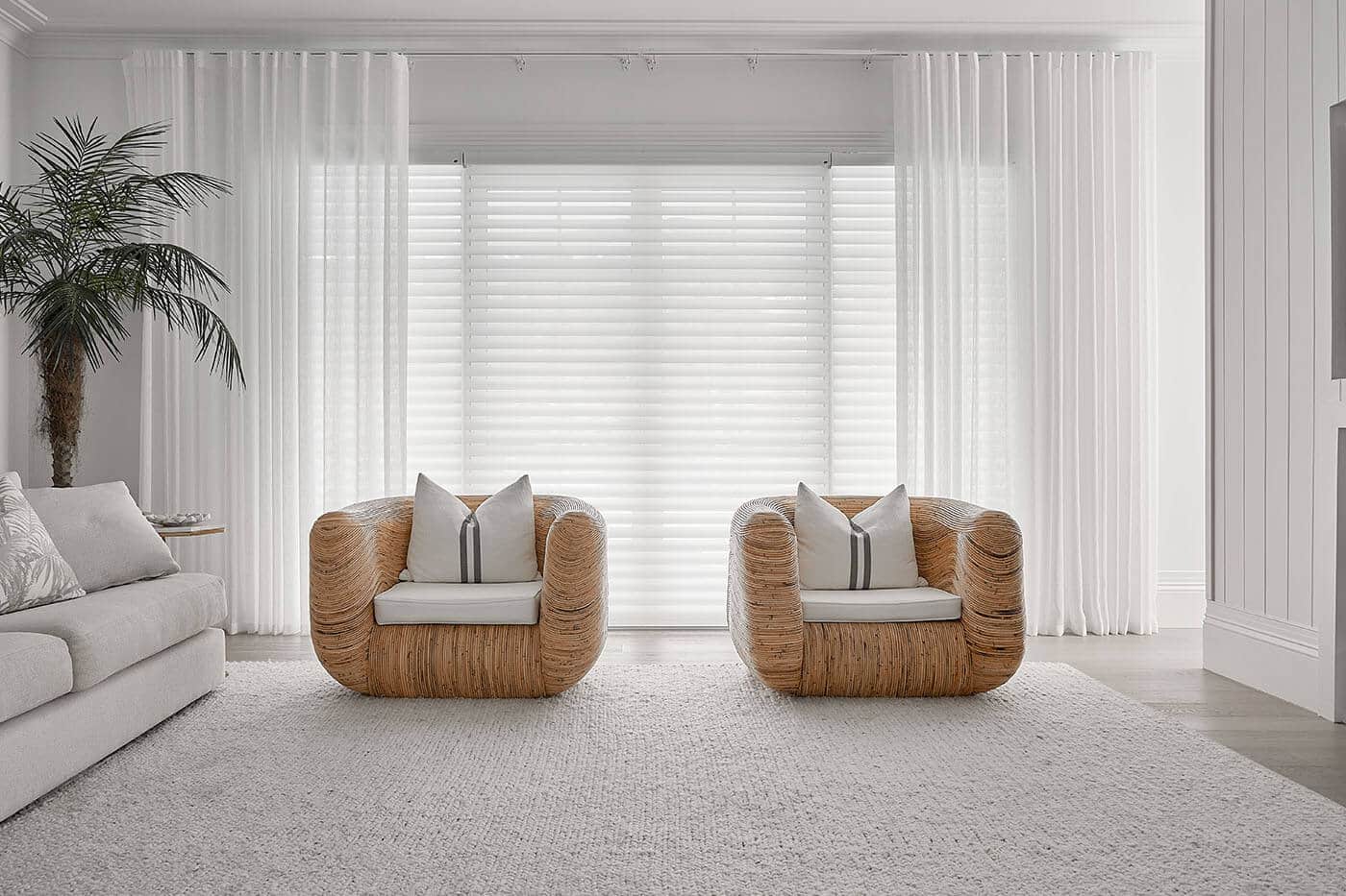Modern contemporary living room in Indooroopilly featuring Blinds and Curtains from Complete Blinds Brisbane.